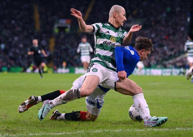 “Chaos at Celtic-Rangers Clash: Police Intervene as Celtic Dugout Bombarded with ‘Objects’ Amid Controversy”